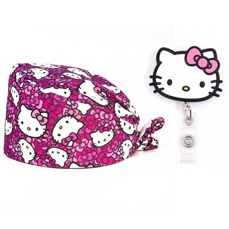 Pink Hello Kitty scrub cap with Hello Kitty face badge reel